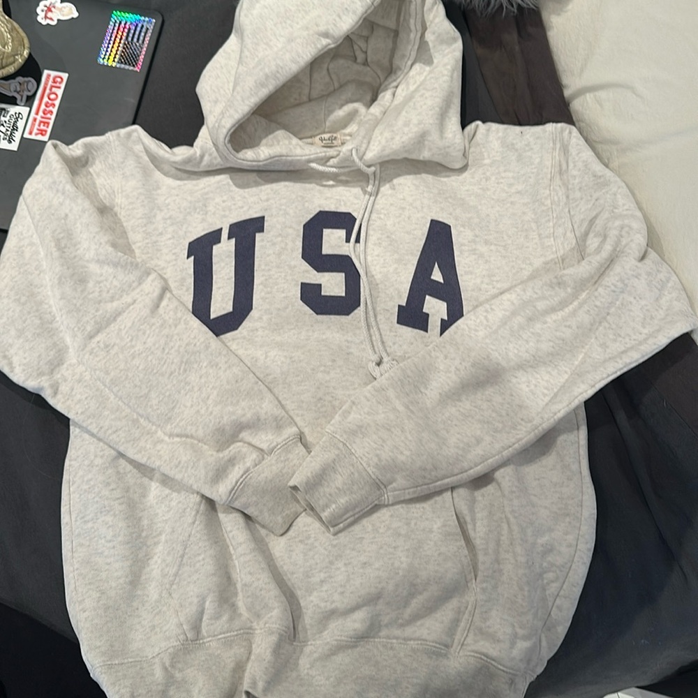 Brandy Melville hoodie USA on it light grey and blue writing